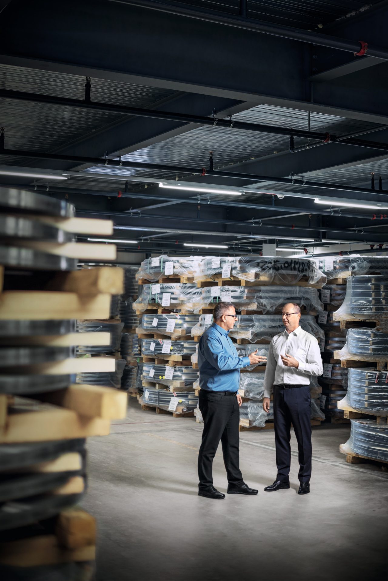 Antoine D’Aversa and Joachim Zappe in the steel warehouse of the STIHL chain plant in Wil (Switzerland)